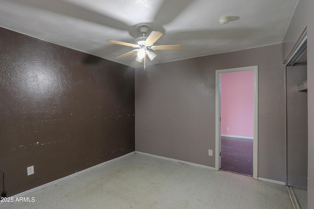 empty room with ceiling fan