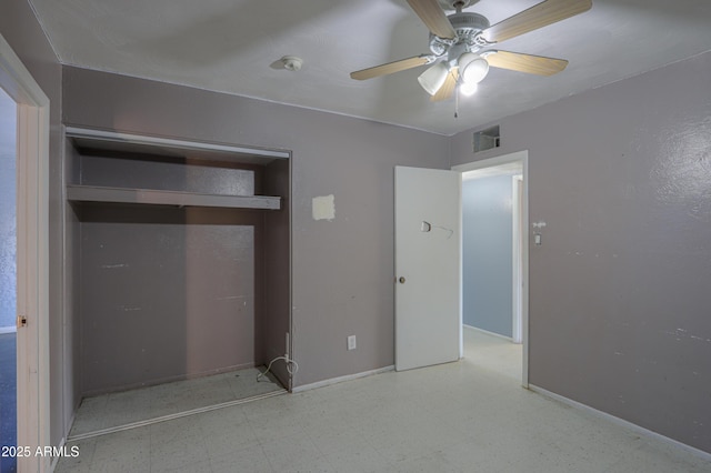 unfurnished bedroom featuring a closet and ceiling fan