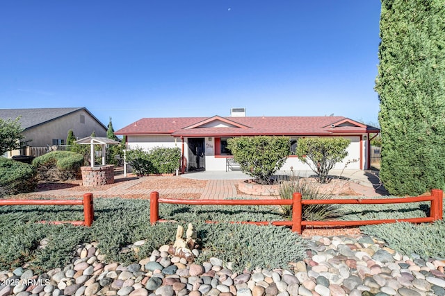 ranch-style house featuring a garage