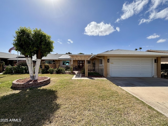 ranch-style home featuring an attached garage, brick siding, fence, concrete driveway, and a front yard