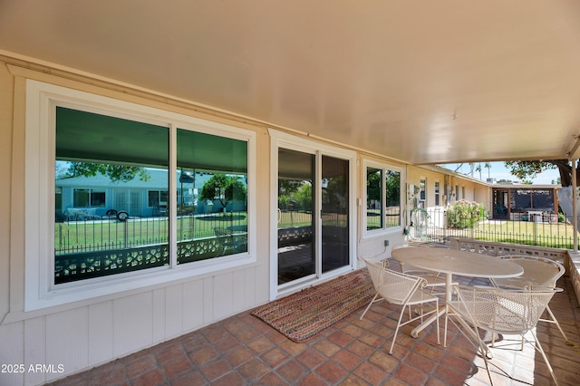 view of patio / terrace featuring outdoor dining space and fence