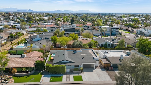 drone / aerial view featuring a mountain view