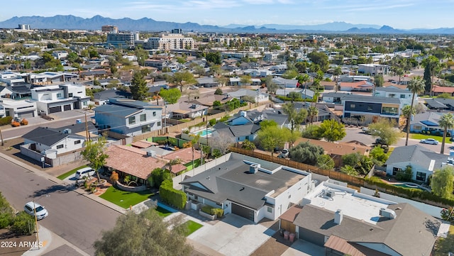 drone / aerial view featuring a mountain view