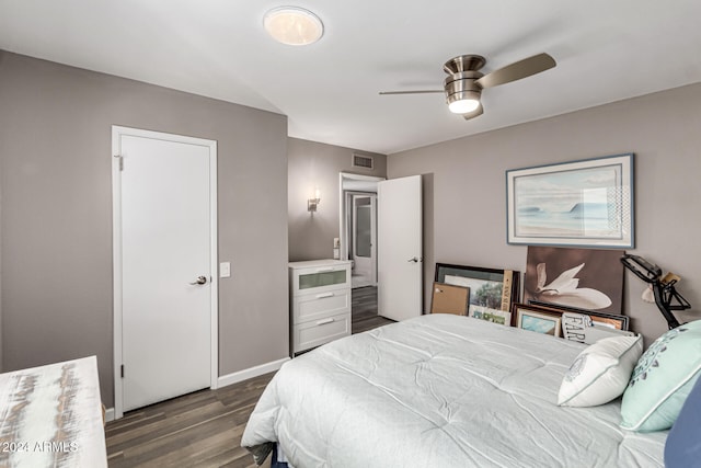 bedroom with dark wood-type flooring and ceiling fan