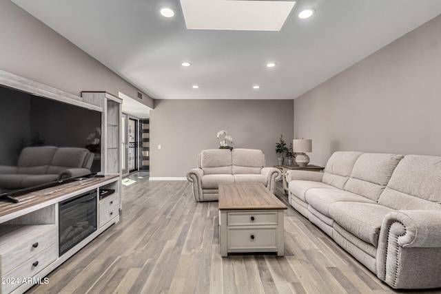 living room with light hardwood / wood-style floors