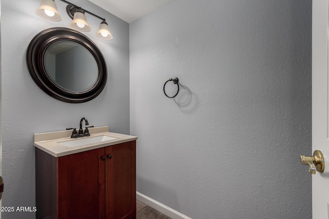 bathroom with vanity and tile patterned floors