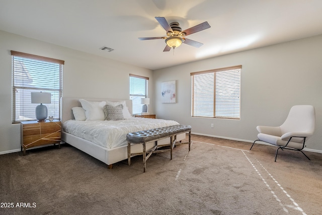 bedroom with ceiling fan and carpet