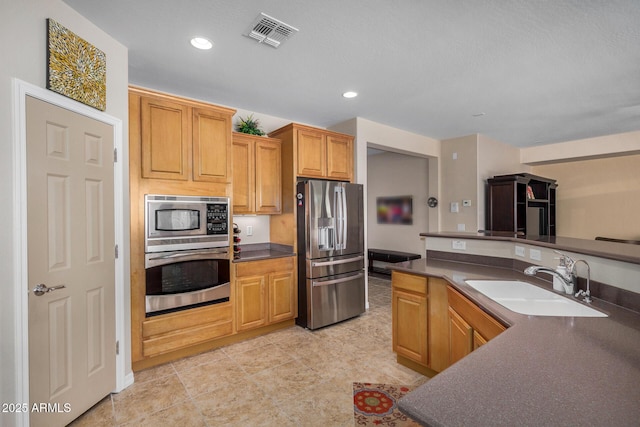 kitchen with stainless steel appliances and sink