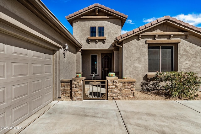 property entrance with a garage