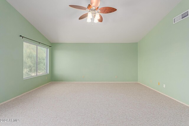 4356 E Rancho Tierra Dr, Cave Creek, AZ 85331 - unfurnished room featuring vaulted ceiling, a ceiling fan, carpet floors, and baseboards