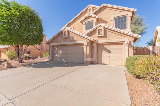 view of front of property with a garage