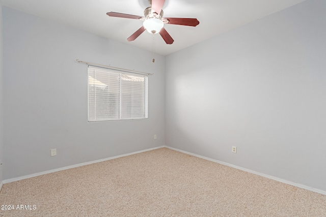 spare room with carpet flooring and ceiling fan