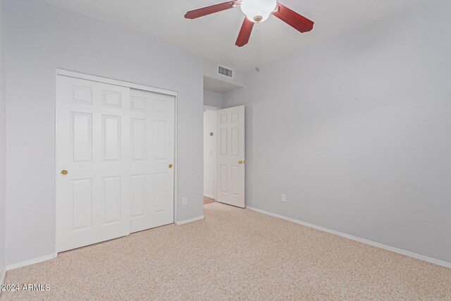 4356 E Rancho Tierra Dr, Cave Creek, AZ 85331 - unfurnished bedroom featuring carpet flooring, baseboards, a closet, and a ceiling fan