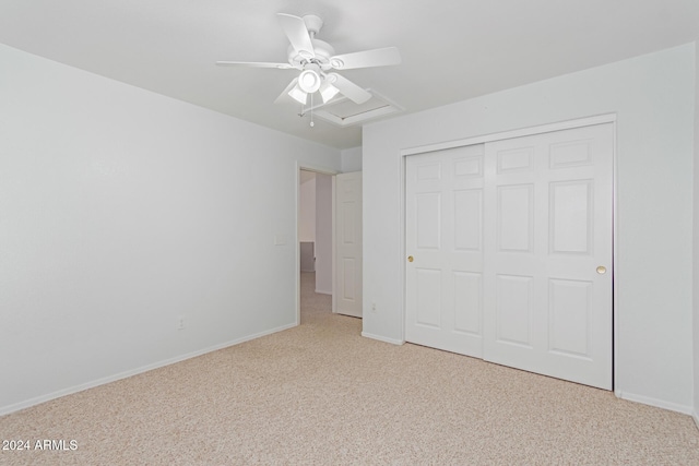 4356 E Rancho Tierra Dr, Cave Creek, AZ 85331 - unfurnished bedroom with carpet, a closet, baseboards, and a ceiling fan
