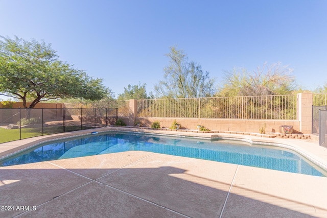 4356 E Rancho Tierra Dr, Cave Creek, AZ 85331 - view of swimming pool featuring a fenced backyard and a patio