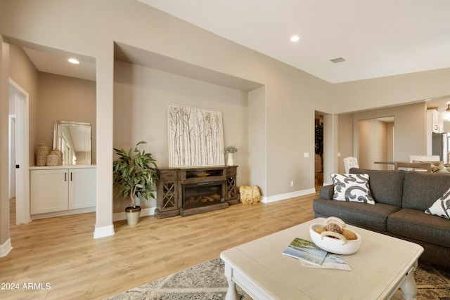 living room with light hardwood / wood-style floors