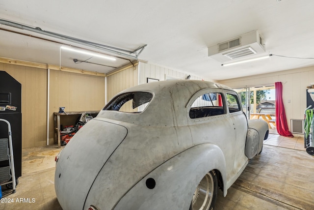 garage with wooden walls