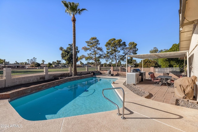 view of pool featuring a patio area