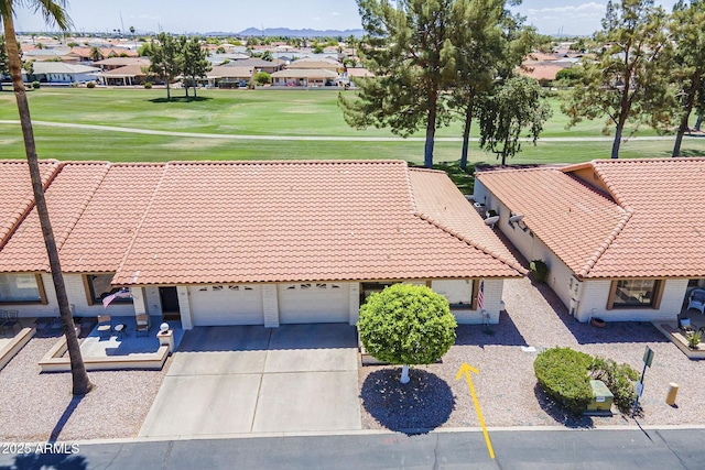 bird's eye view featuring view of golf course and a residential view