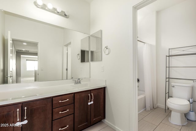 2920 E Virginia St E, Mesa, AZ 85213 - full bathroom with double vanity, toilet, shower / bath combo with shower curtain, tile patterned flooring, and baseboards