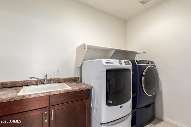 2920 E Virginia St E, Mesa, AZ 85213 - laundry room featuring a sink, independent washer and dryer, and light tile patterned floors