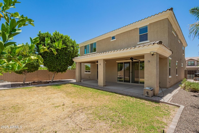 2920 E Virginia St E, Mesa, AZ 85213 - rear view of house featuring stucco siding, ceiling fan, a tiled roof, and a patio area