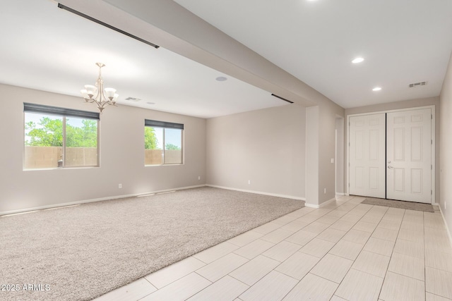 2920 E Virginia St E, Mesa, AZ 85213 - spare room with a chandelier, light colored carpet, baseboards, and recessed lighting
