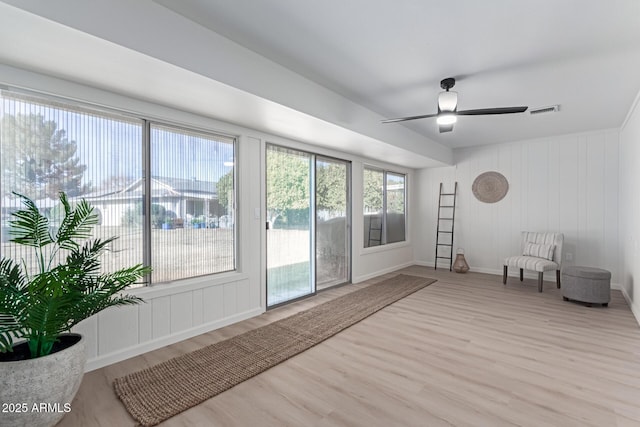 interior space featuring ceiling fan and light wood-type flooring