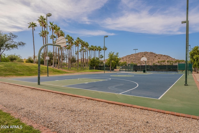 view of sport court with a mountain view