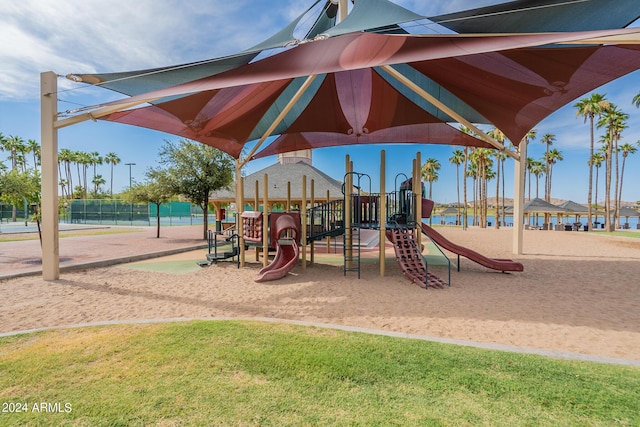 community jungle gym featuring fence