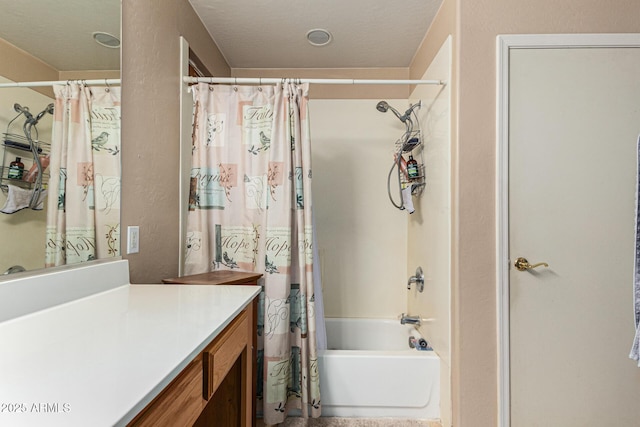 bathroom with vanity and shower / bath combo