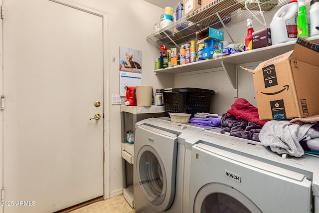 laundry room with separate washer and dryer