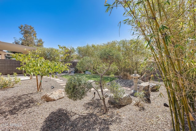 view of yard with fence