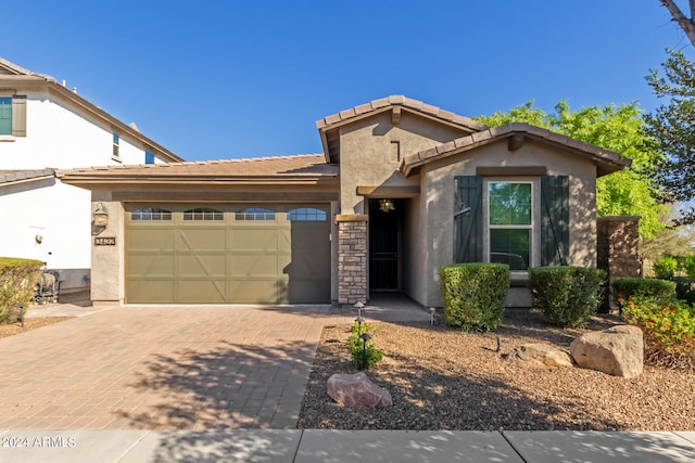 view of front of home with a garage