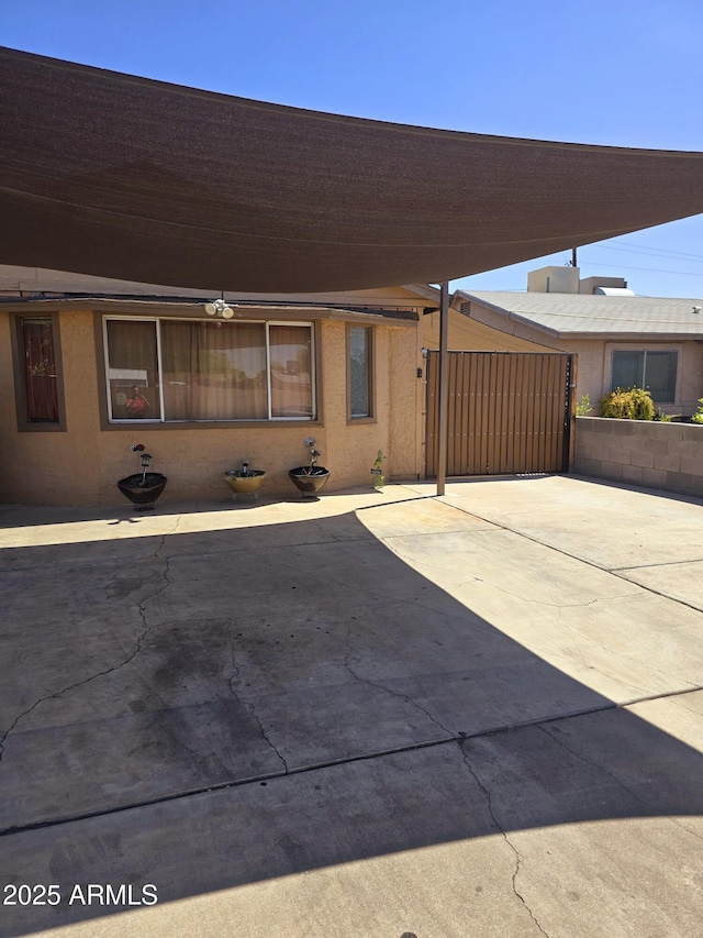 view of patio with an attached carport