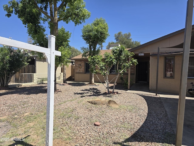 view of yard featuring fence