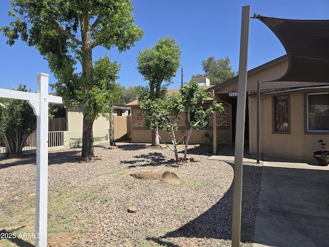 view of yard featuring fence