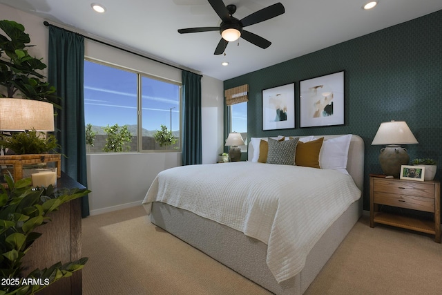 carpeted bedroom featuring ceiling fan