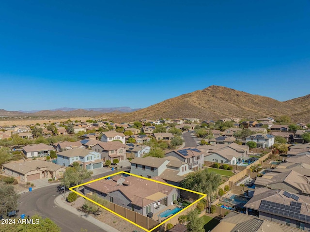 drone / aerial view featuring a mountain view