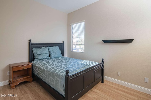 bedroom featuring light wood-type flooring