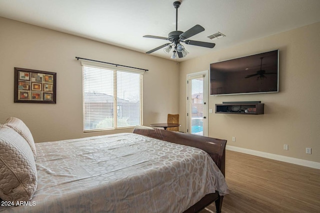 bedroom featuring hardwood / wood-style floors and ceiling fan