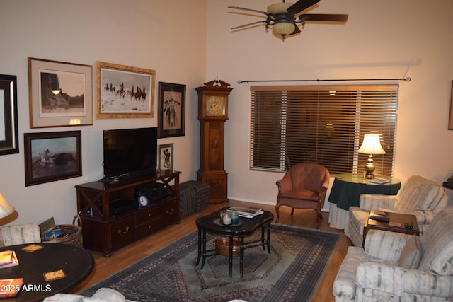 living room with hardwood / wood-style floors and ceiling fan