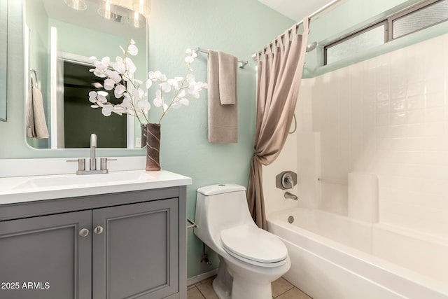 14919 W Hearn Cir, Surprise, AZ 85379 - full bathroom with toilet, vanity, shower / tub combo, and tile patterned floors