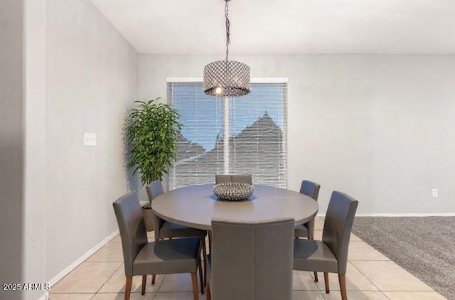 14919 W Hearn Cir, Surprise, AZ 85379 - dining space featuring light tile patterned flooring and baseboards