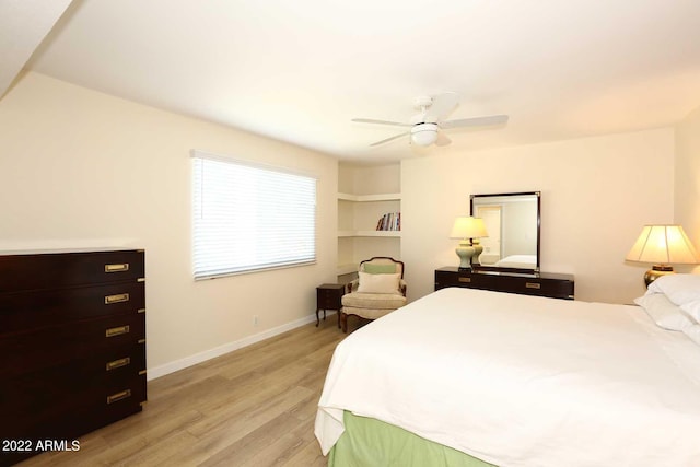 bedroom featuring ceiling fan and light hardwood / wood-style flooring