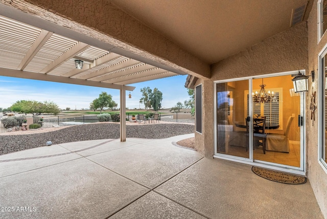 view of patio featuring a pergola