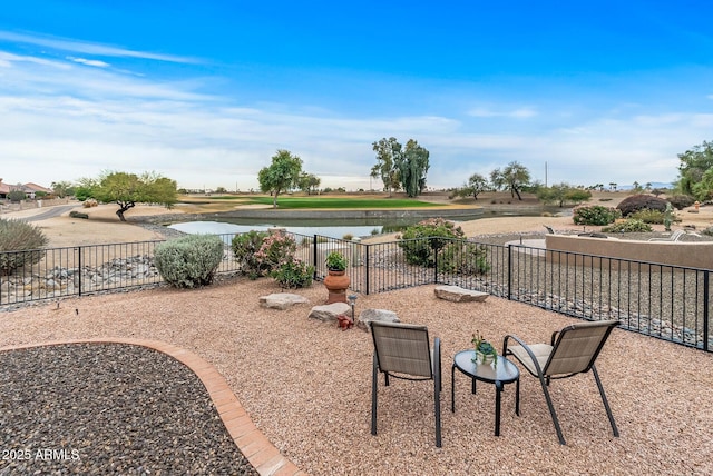 view of patio / terrace featuring a water view