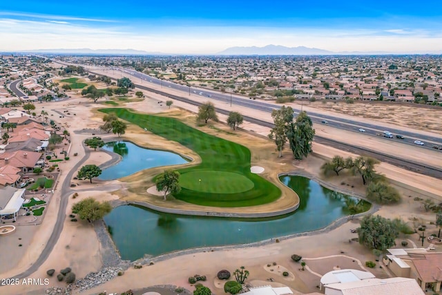 bird's eye view with a water and mountain view