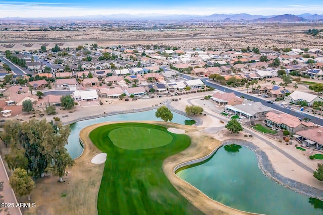 bird's eye view with a water and mountain view