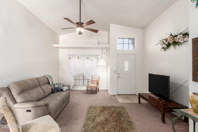 living room with ceiling fan, light colored carpet, a textured ceiling, and high vaulted ceiling